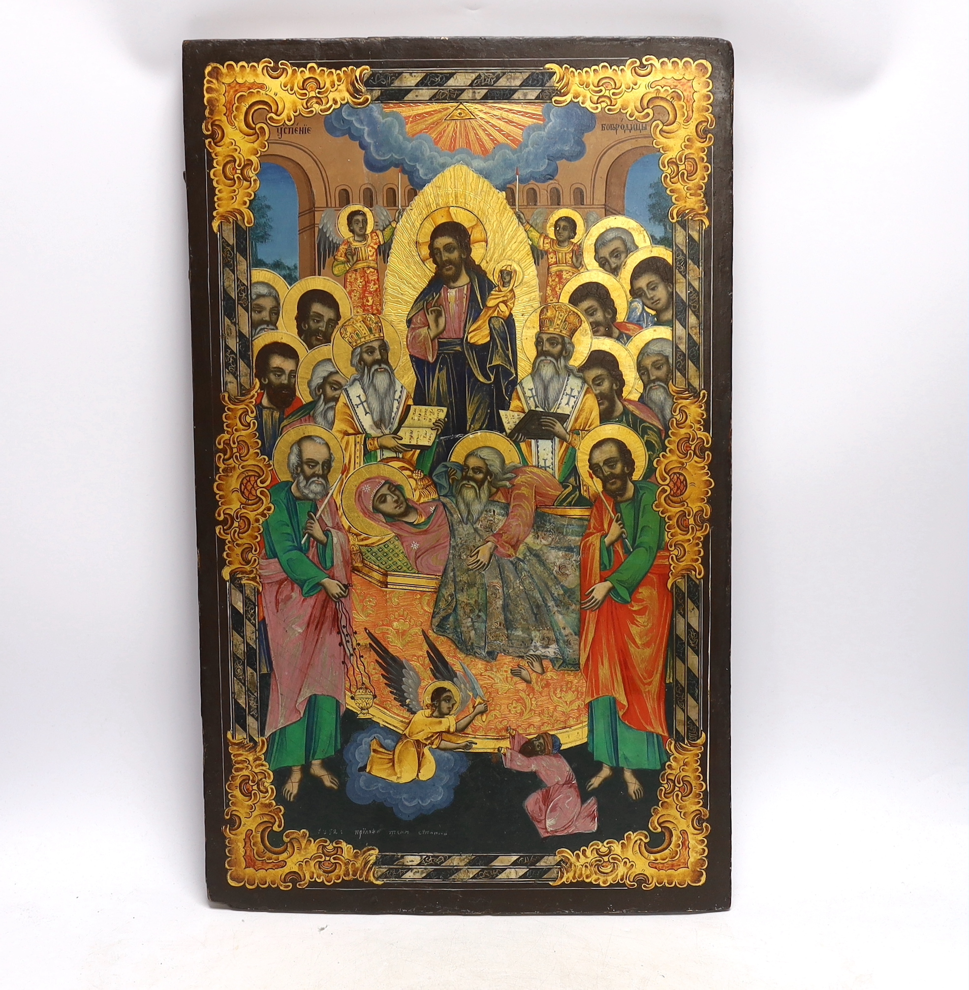 A 19th century and later Russian Icon, 32cm x 53cm